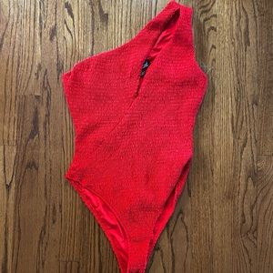 Red one shoulder bodysuit